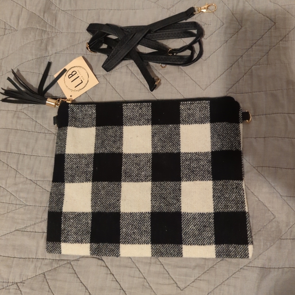 Black and white buffalo plaid clutch with strap